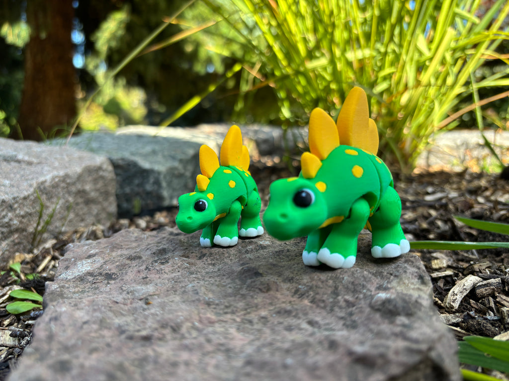 Sunny & Shadow, the Spiketail Stegos of Glimmer Fern Forest