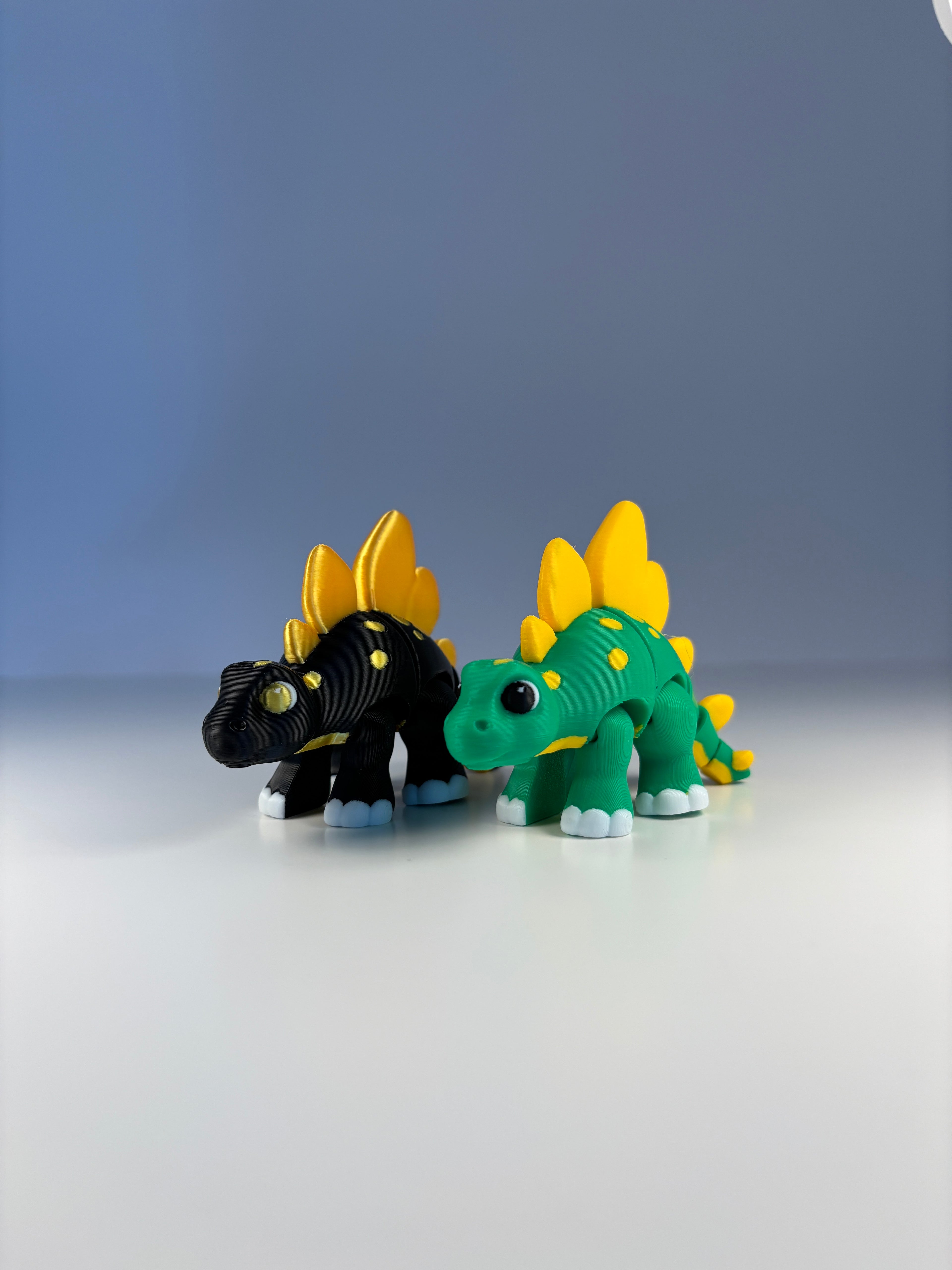 Sunny & Shadow, the Spiketail Stegos of Glimmer Fern Forest